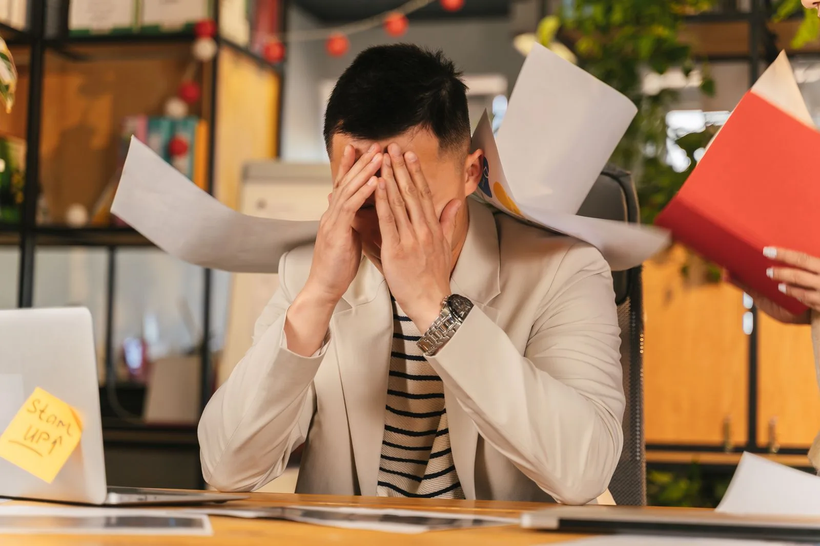 Person displaying anxiety symptoms including stress and worry