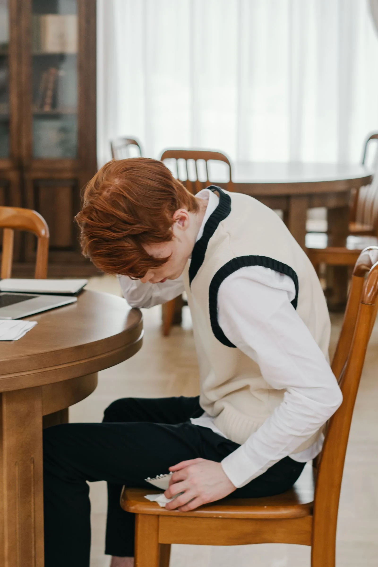 Person appearing anxious and stressed during a high-pressure moment