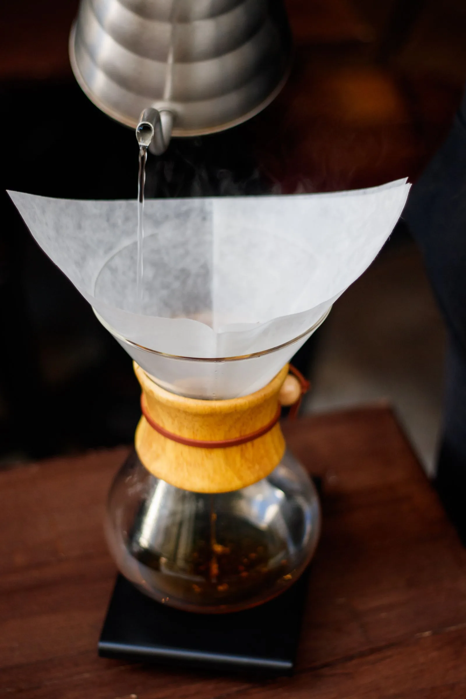 Coffee brewing process with grounds and hot water preparation
