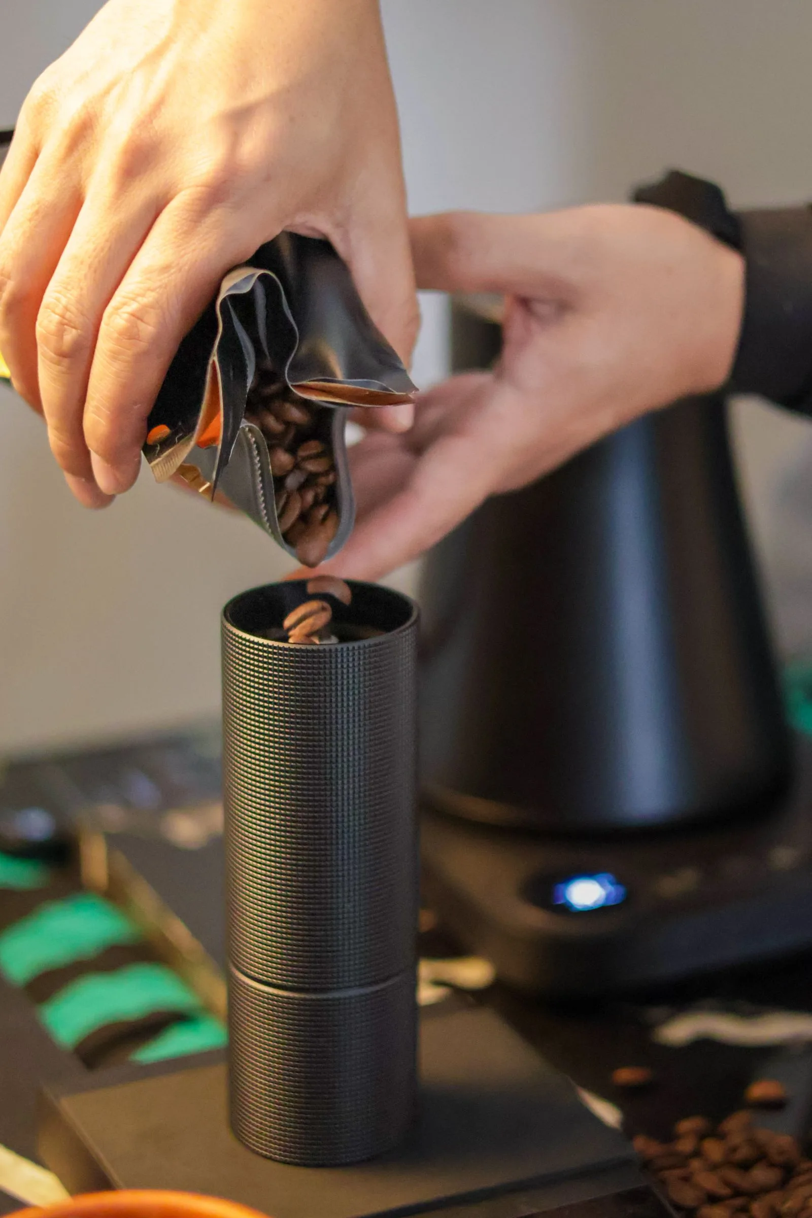 Burr coffee grinder set to medium-fine grind size for Vietnamese brewing